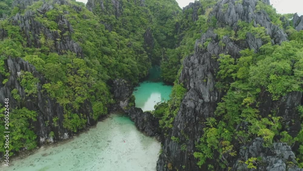 aerial shot of small lagoon in El Nido Palawan Philippines aerial shot of small lagoon in El Nido Palawan Philippines
