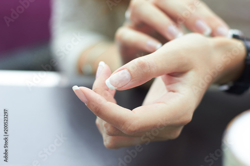 Wallpaper Mural Woman looking at her watch. Just hands at the image. Torontodigital.ca