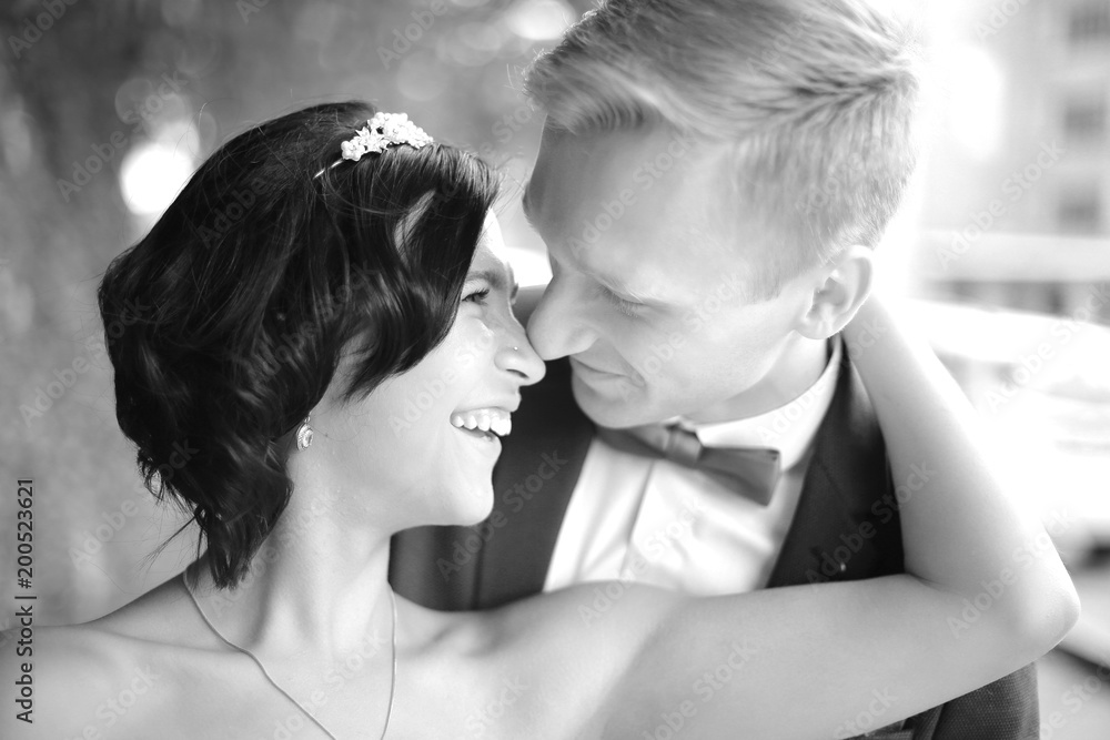 black-and-white photo.closeup. portrait of happy groom and beautiful bride black-and-white photo.closeup. portrait of happy groom and beautiful bride
