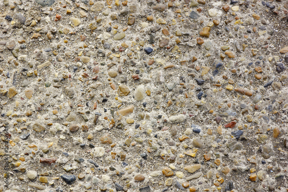 stone and cement texture background. small river stones with cement for sidewalks stone and cement texture background. small river stones with cement for sidewalks