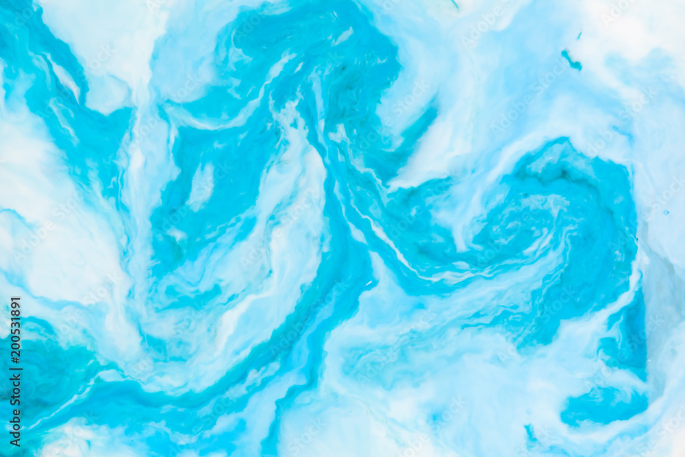 Coloring ink flowing and mixing in milk texture. background image Coloring ink flowing and mixing in milk texture. background image