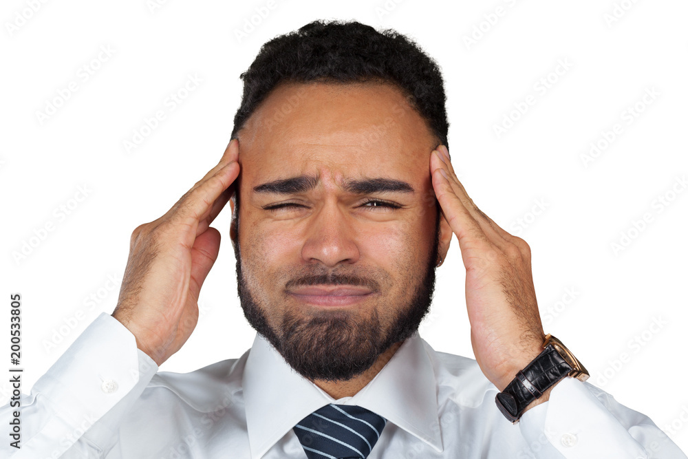 Young black businessman with a headache isolated on white background Young black businessman with a headache isolated on white background