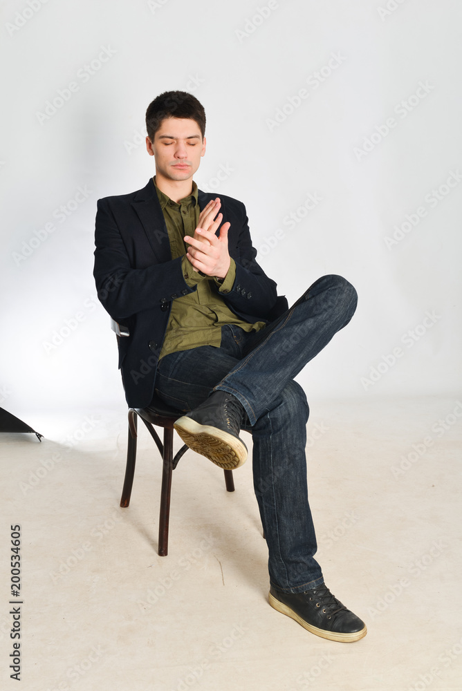young man, guy emotionally posing in the studio - isolated young man, guy emotionally posing in the studio - isolated