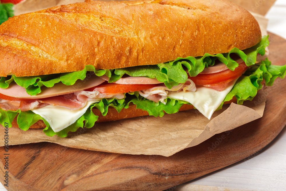 sandwich on a wooden table sandwich on a wooden table