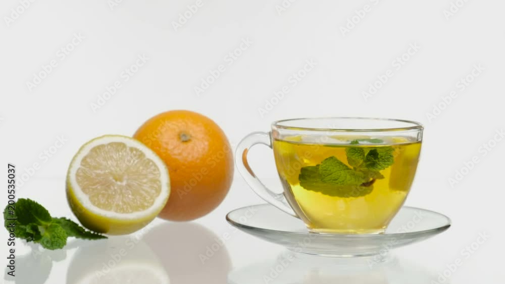 Fresh and cold ice tea with sliced lemon and mint Fresh and cold ice tea with sliced lemon and mint