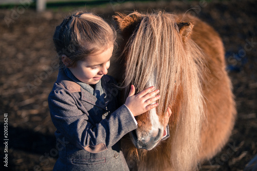 Kind mit Ponys  photo