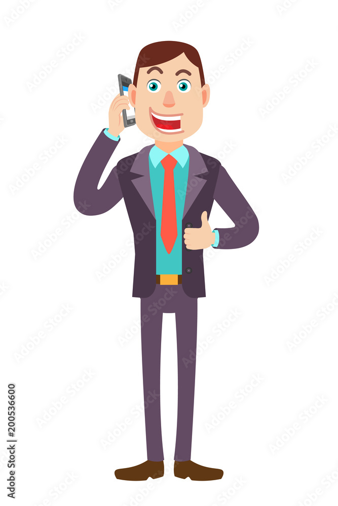 Businessman talking on mobile phone and showing thumb up