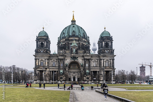 Berliner Dom und Berliner Fernsehturm und Rotes Rathaus mit tiefem Wolkenhimmel photo