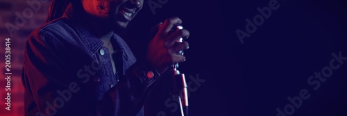 Sticker Male singer performing in popular music concert