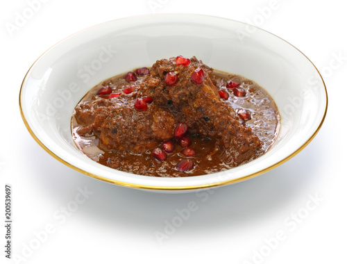 khoresht fesenjan ba morgh, chicken stew with pomegranate & walnut, iranian persian cuisine photo