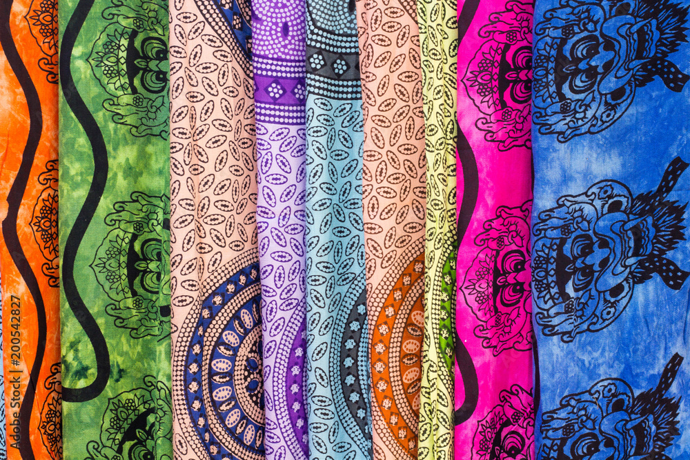 Traditional balinese sarongs in diffrent colors in local market of Bali Traditional balinese sarongs in diffrent colors in local market of Bali