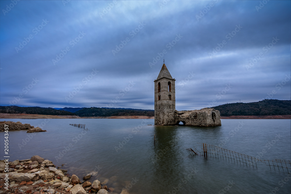 Bell tower submerged in a lake