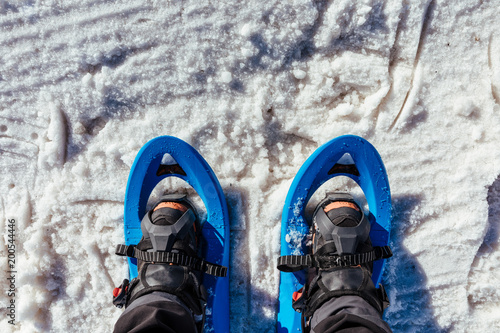 Walking with snowshoes in the snow