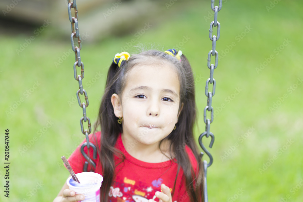 Happy Girl Drinking Milk or Yogurt Happy Girl Drinking Milk or Yogurt