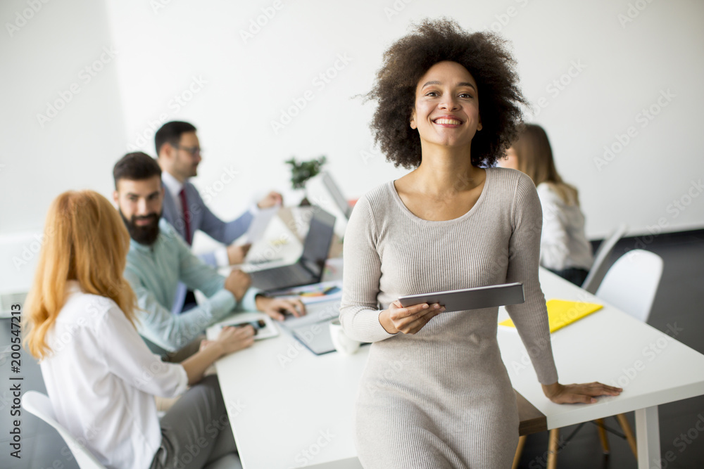 Multiethnic business team working at the same office Multiethnic business team working at the same office