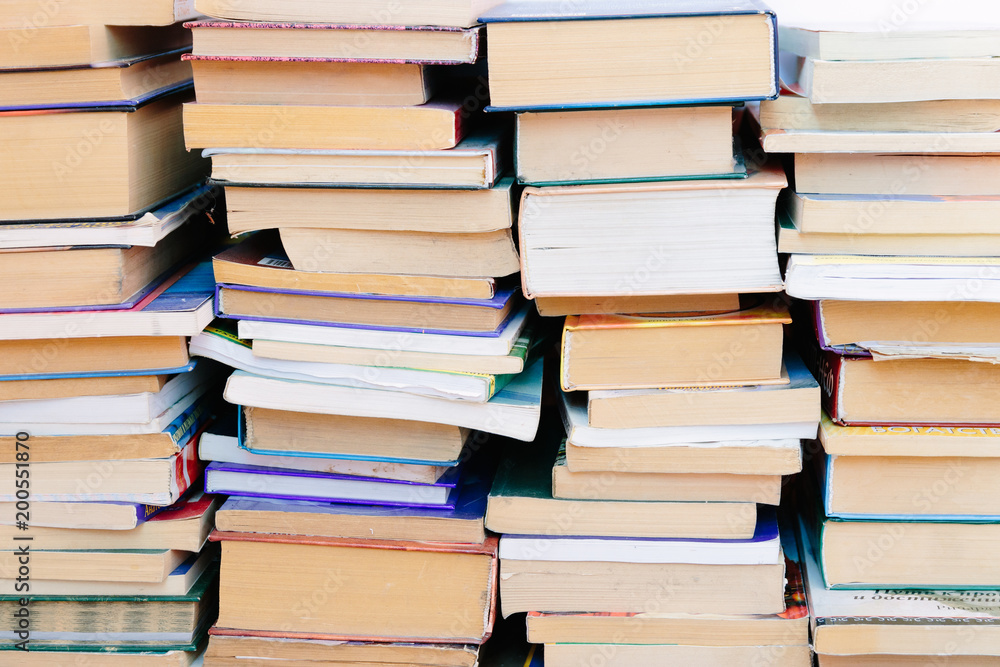 Stack of books background. many books piles. Stack of books background. many books piles.