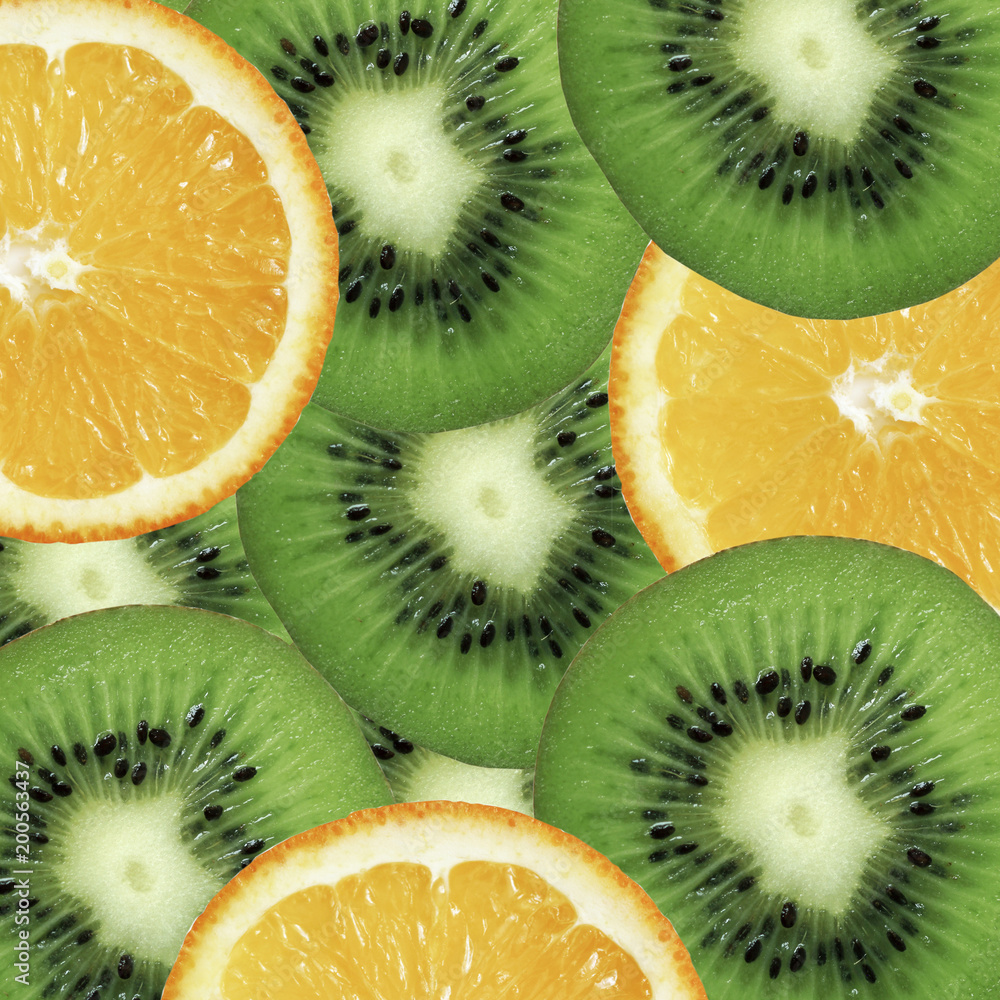 Naklejka zdjęcie-zdjęcie-tło-z-pomarańczowo-zielono-kiwi-owoce-zdrowe-jedzenie-panorama