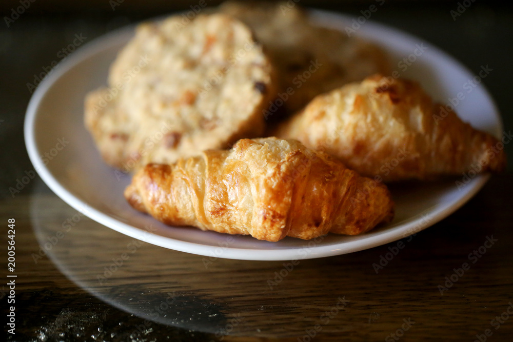 Photo of macro delicious croissants and cookies