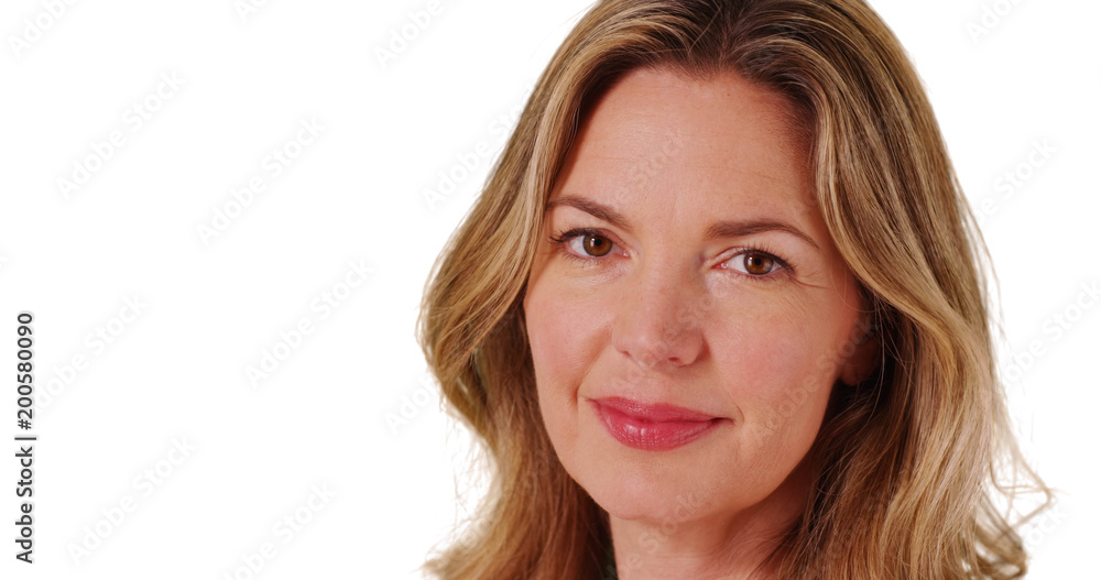 Close up of attractive woman smiling at camera Close up of attractive woman smiling at camera