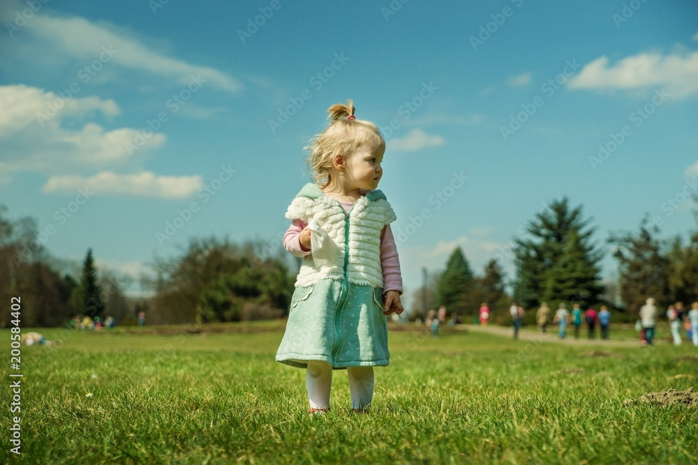 Little baby girl on a walk in the Park Little baby girl on a walk in the Park