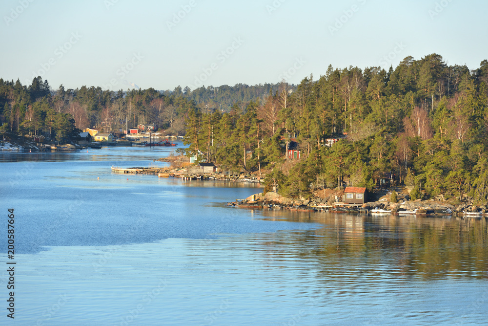 Obraz premium Stockholm archipelago, largest archipelago in Sweden, and second-largest archipelago in Baltic Sea. Archipelago extends from Stockholm roughly 60 kilometres (37 mi) to east. Early spring