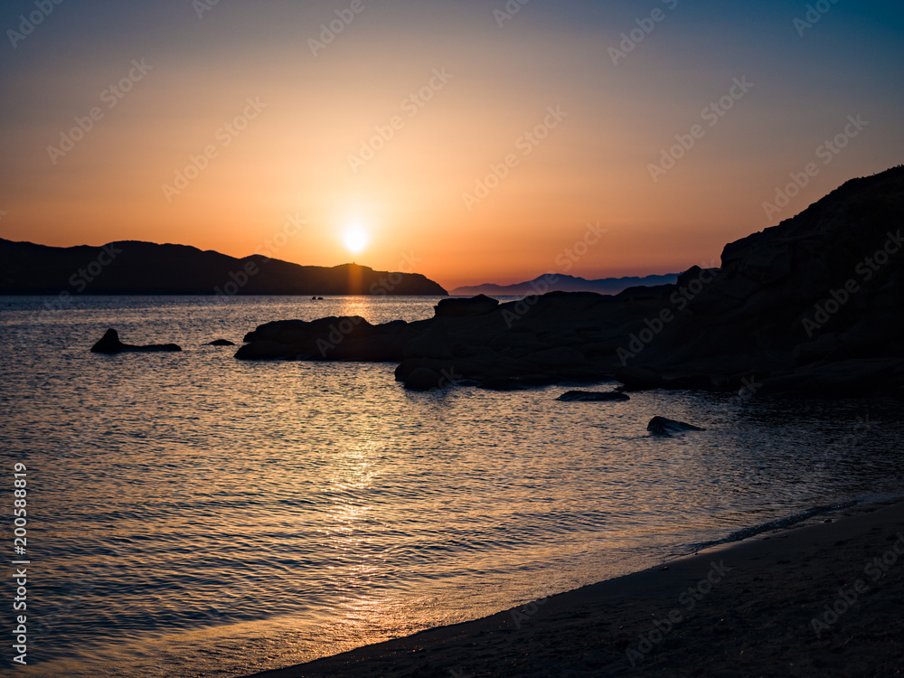 The sun sets over the sea in the wonderful Sardinia.