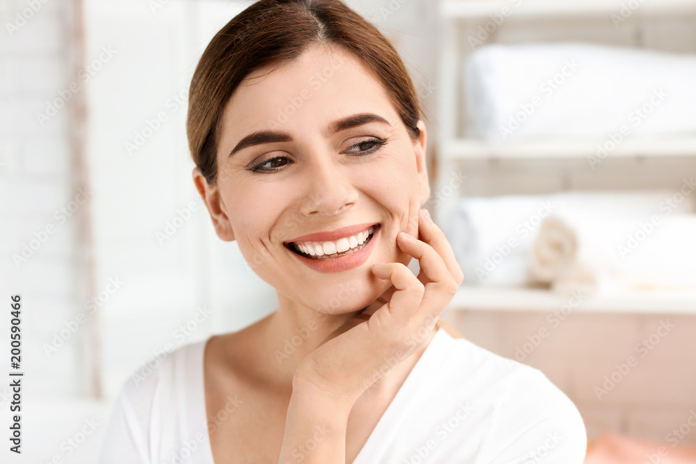 Young woman with beautiful smile indoors. Teeth whitening Young woman with beautiful smile indoors. Teeth whitening