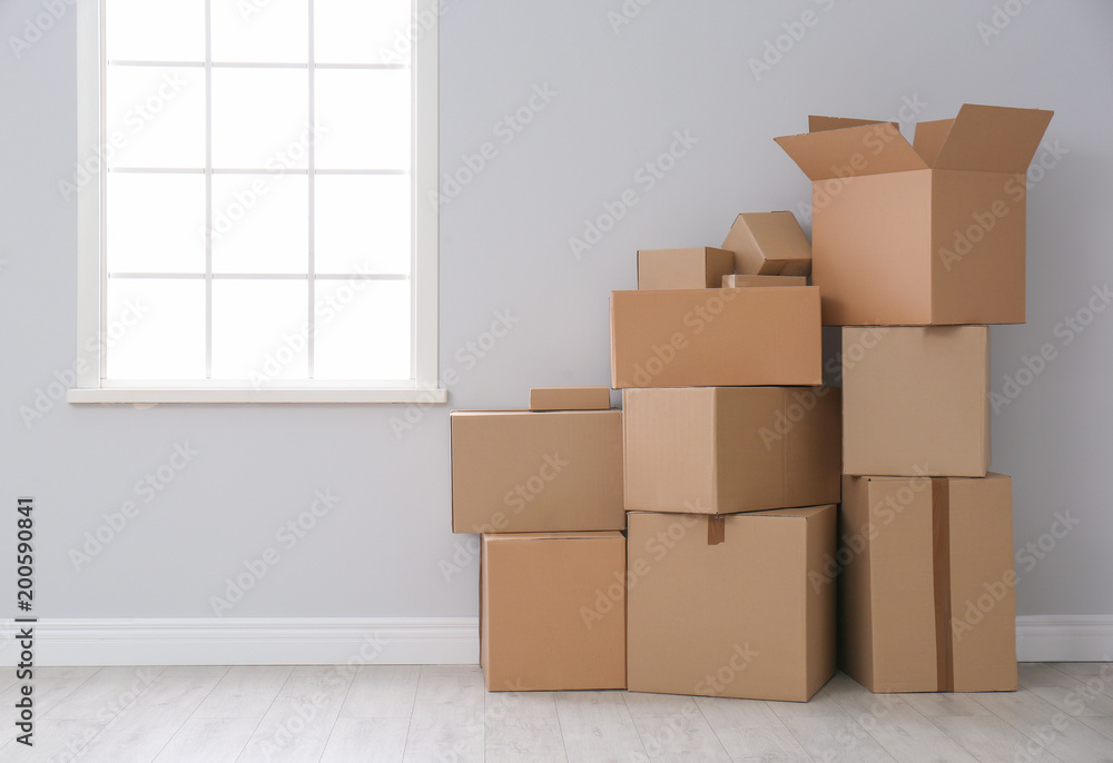 Cardboard boxes on floor indoors Cardboard boxes on floor indoors