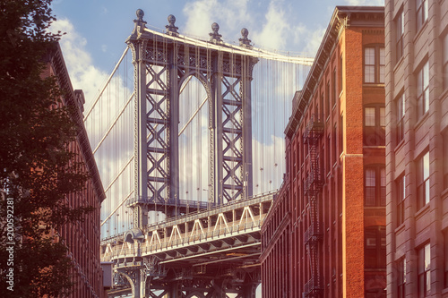 Famous view of the Manhattan Bridge from an old street in Brooklyn © kmiragaya