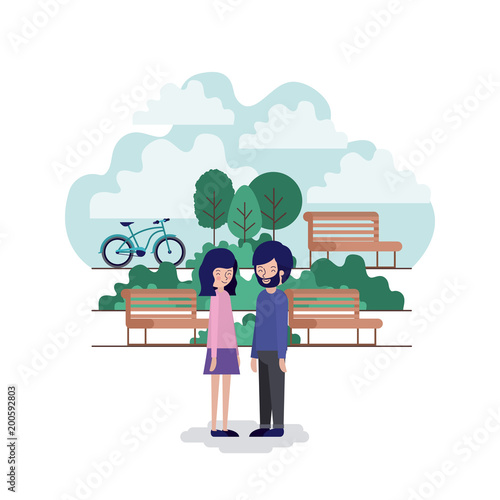 couple in the park scene with chair and bicycle