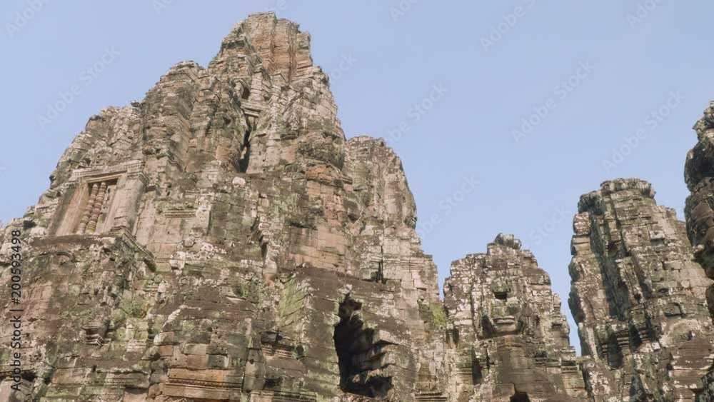 Image of Buddha recognisable in ruins of Angkor Wat temple Image of Buddha recognisable in ruins of Angkor Wat temple