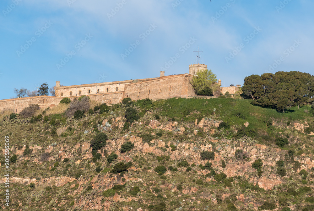 Montjuic fortress overlooking Barcelona harbor from the port