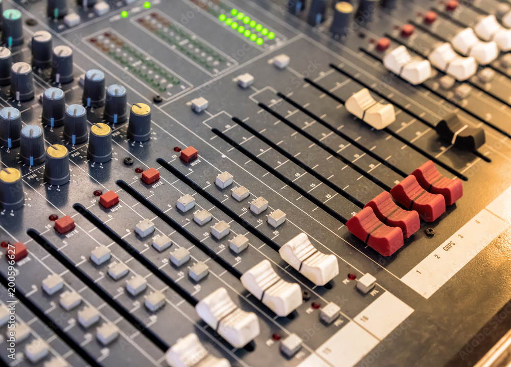 Sound technician audio mixer equalizer control for background. Sound technician audio mixer equalizer control for background.