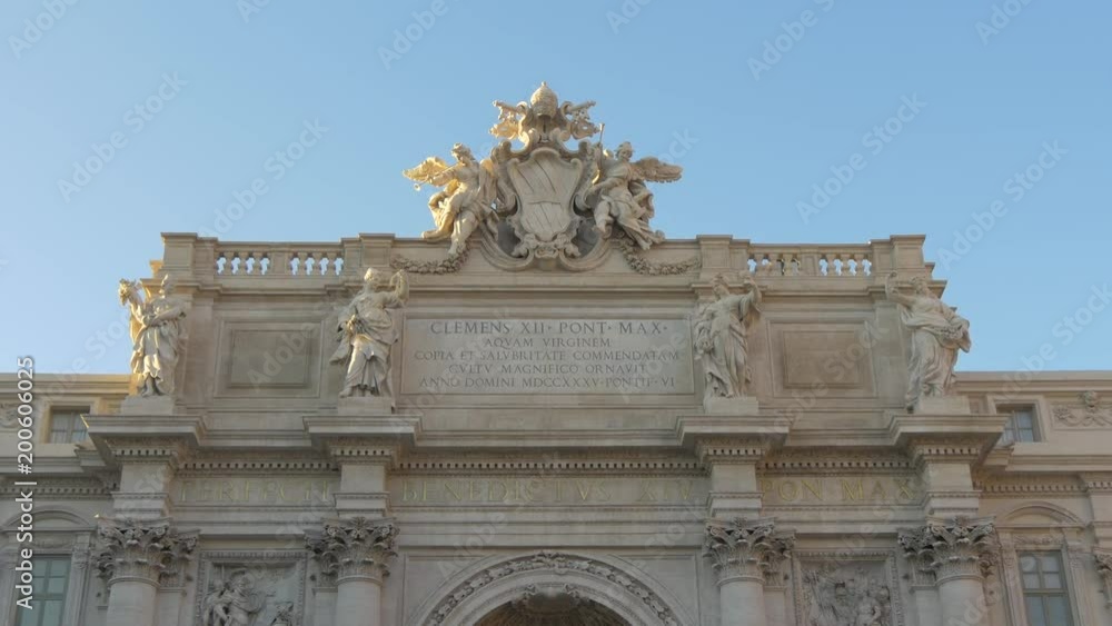 The inscription on Trevi Fountain in Rome The inscription on Trevi Fountain in Rome