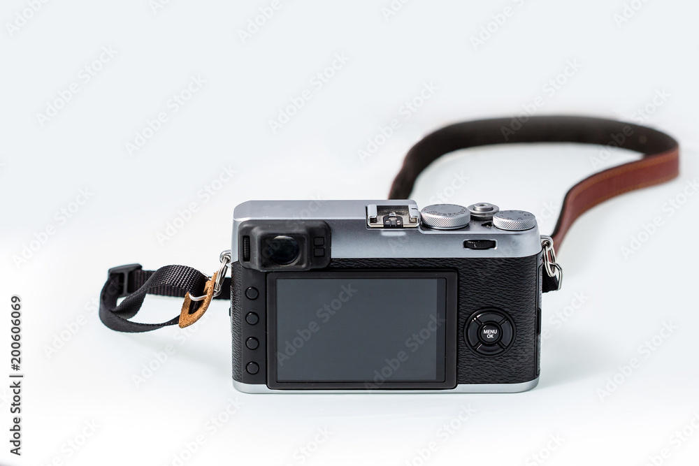 Digital Rangefinder, chrome and black with leather strap, viewed from the back Digital Rangefinder, chrome and black with leather strap, viewed from the back