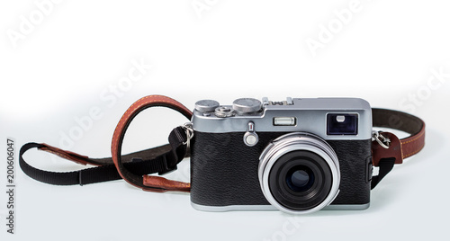 Digital Rangefinder, chrome and black with leather strap, viewed from the front