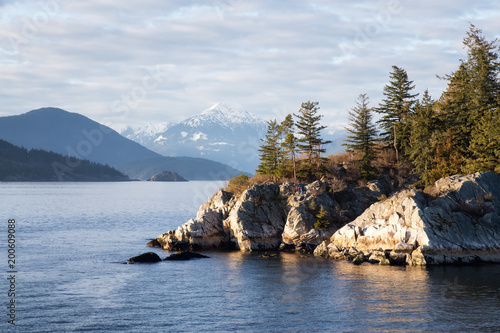 Beautiful Landscape View of Whytecliff Park during a vibrant sunset. Taken in Horseshoe Bay, West Vancouver, British Columbia, Canada. photo