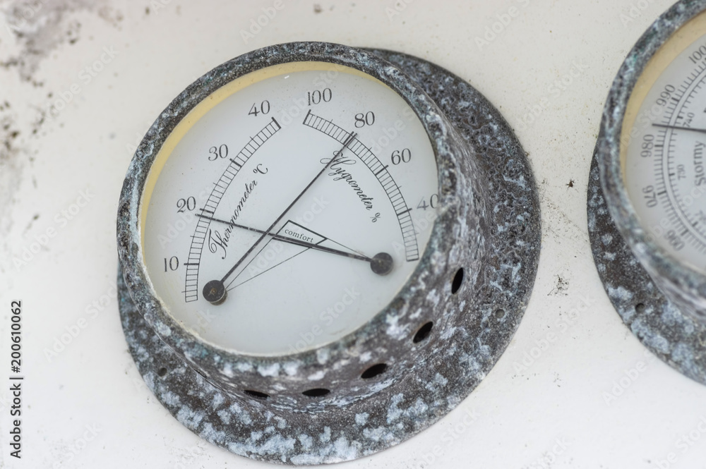 Ship's barometer and thermometer corroded by sea salt