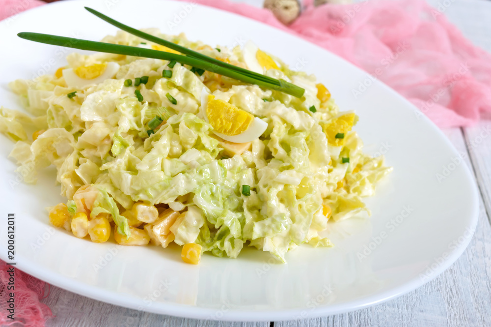 Light spring dietary salad from Chinese cabbage, cheese, quail eggs, corn. Proper nutrition. Light spring dietary salad from Chinese cabbage, cheese, quail eggs, corn. Proper nutrition.