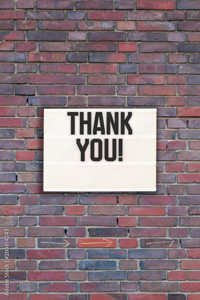Brick wall with empty light box for marketing message Brick wall with empty light box for marketing message