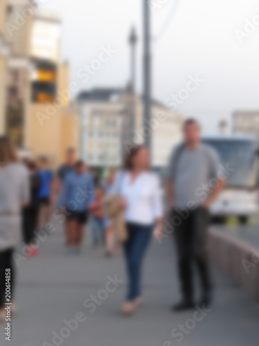 Blur background. Anonymous People on the street. In the summer walking around Moscow.