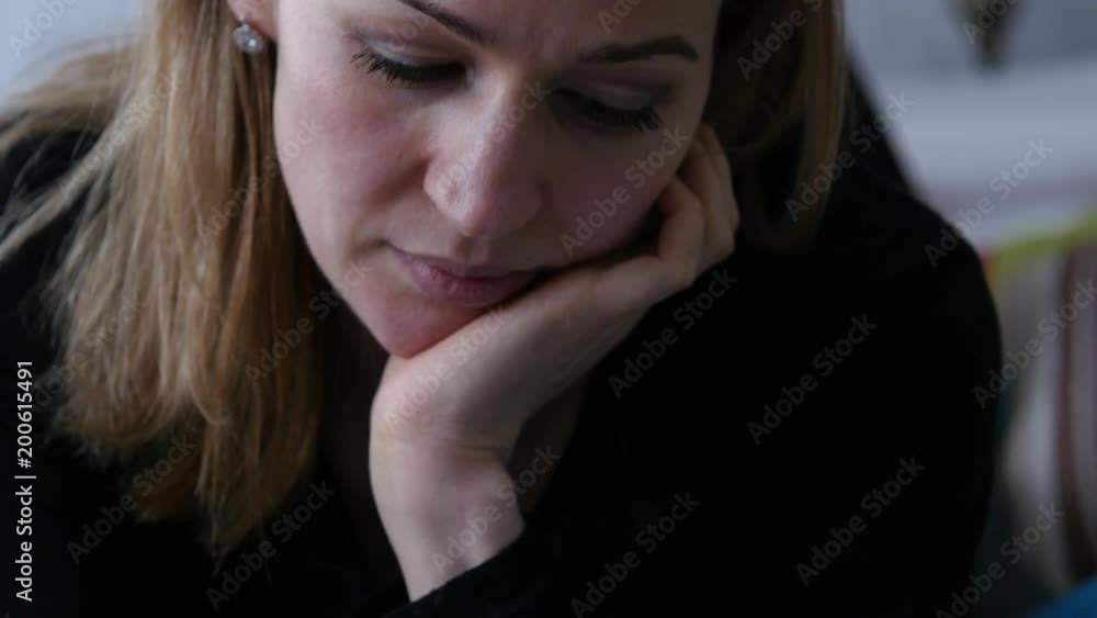 pensive housewife lying on a bed and writing in her diary. 4K pensive housewife lying on a bed and writing in her diary. 4K