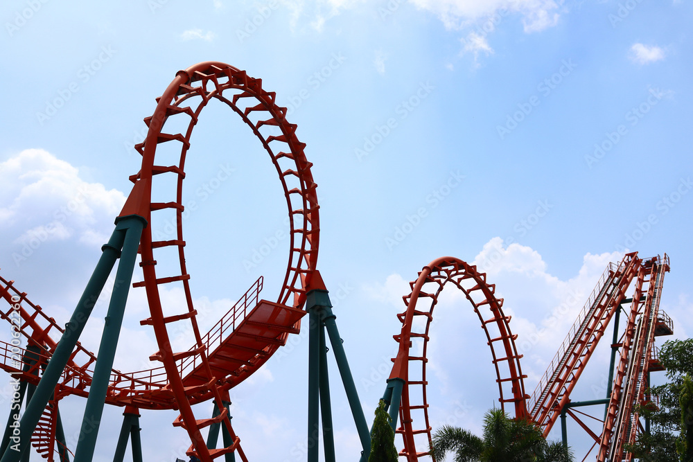 roller coaster with blue sky roller coaster with blue sky
