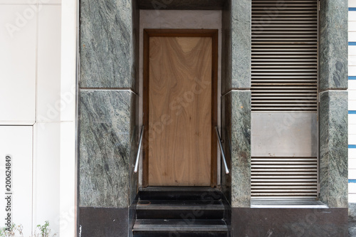 sidewalk by street wall & door