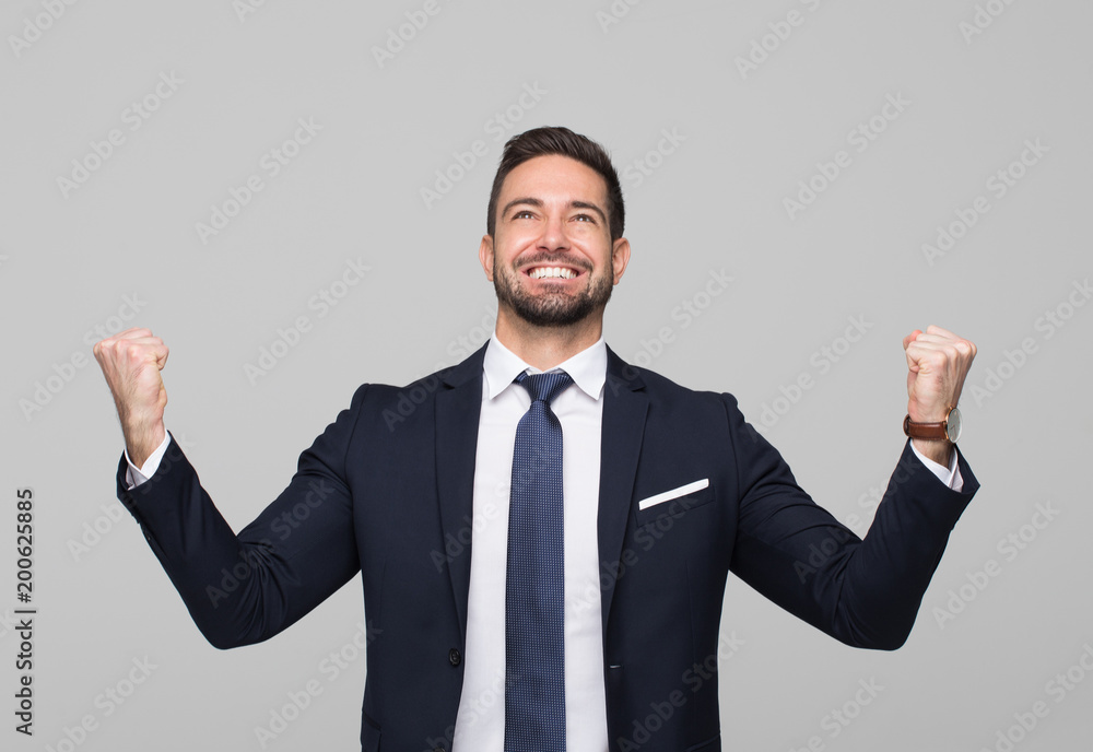 Successful caucasian professional businessman winning Successful caucasian professional businessman winning