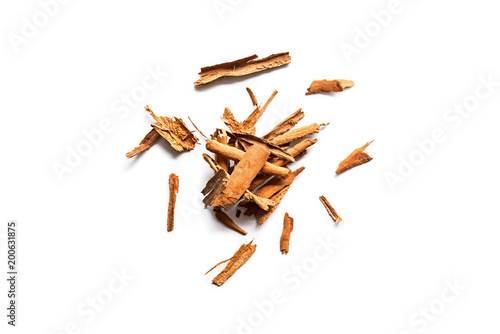Heap of raw organic cinnamon sticks isolated on a white background. Horizontal composition. Top view