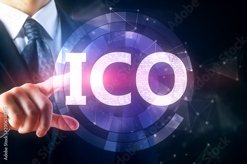 Man pointing at ICO button
