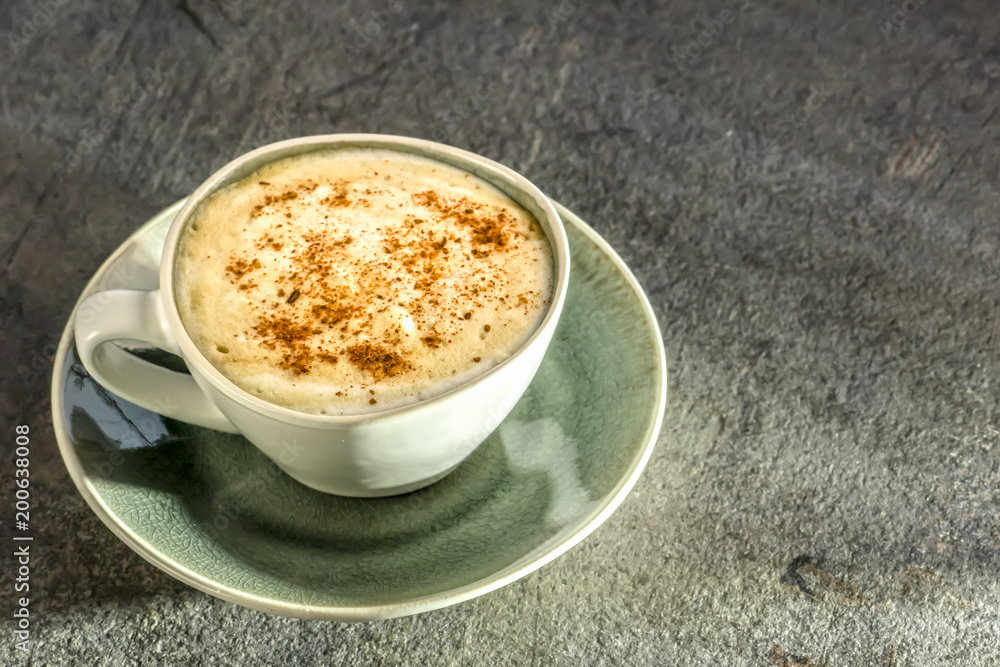 Cup of coffe on dark background - copy space - close up Cup of coffe on dark background - copy space - close up