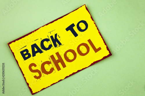 Writing note showing  Back To School. Business photo showcasing Right time to purchase schoolbag  pen  book  stationary written Yellow Colored Sticky note paper plain background.