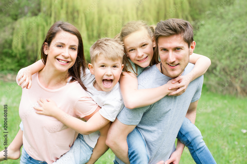 laughing modern family in spring time summer laughing modern family in spring time summer